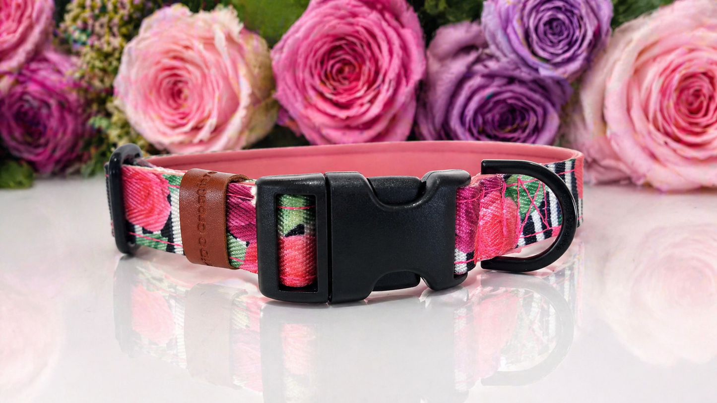 Floral-patterned dog collar with pink and purple roses, black and white stripes and black buckle