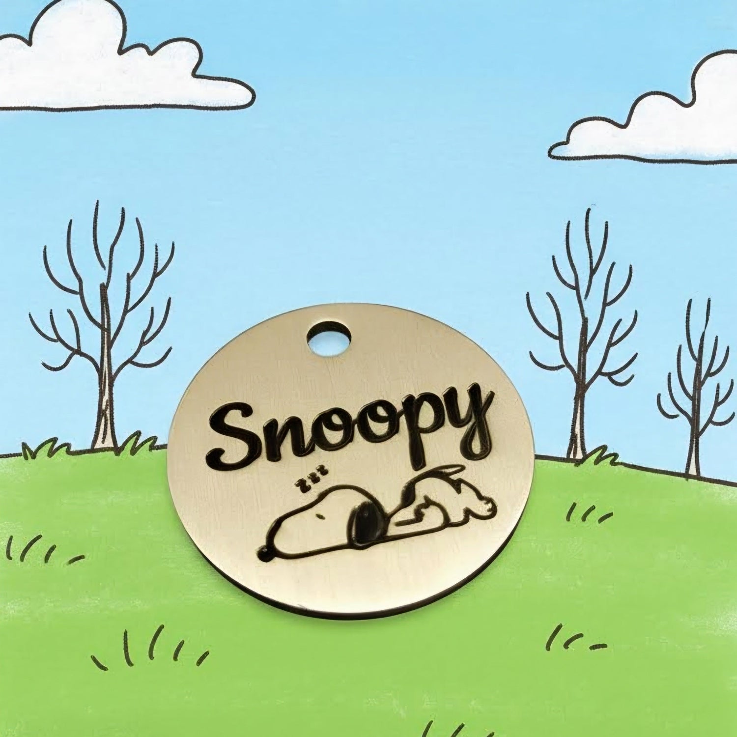 solid brass pet id tag with customers custom artwork of dog named snoopy on it.