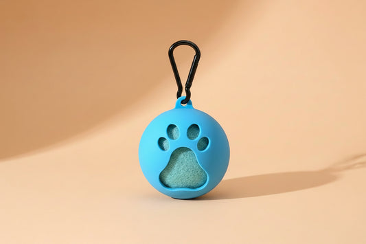 Light blue tennis ball and clip on holder