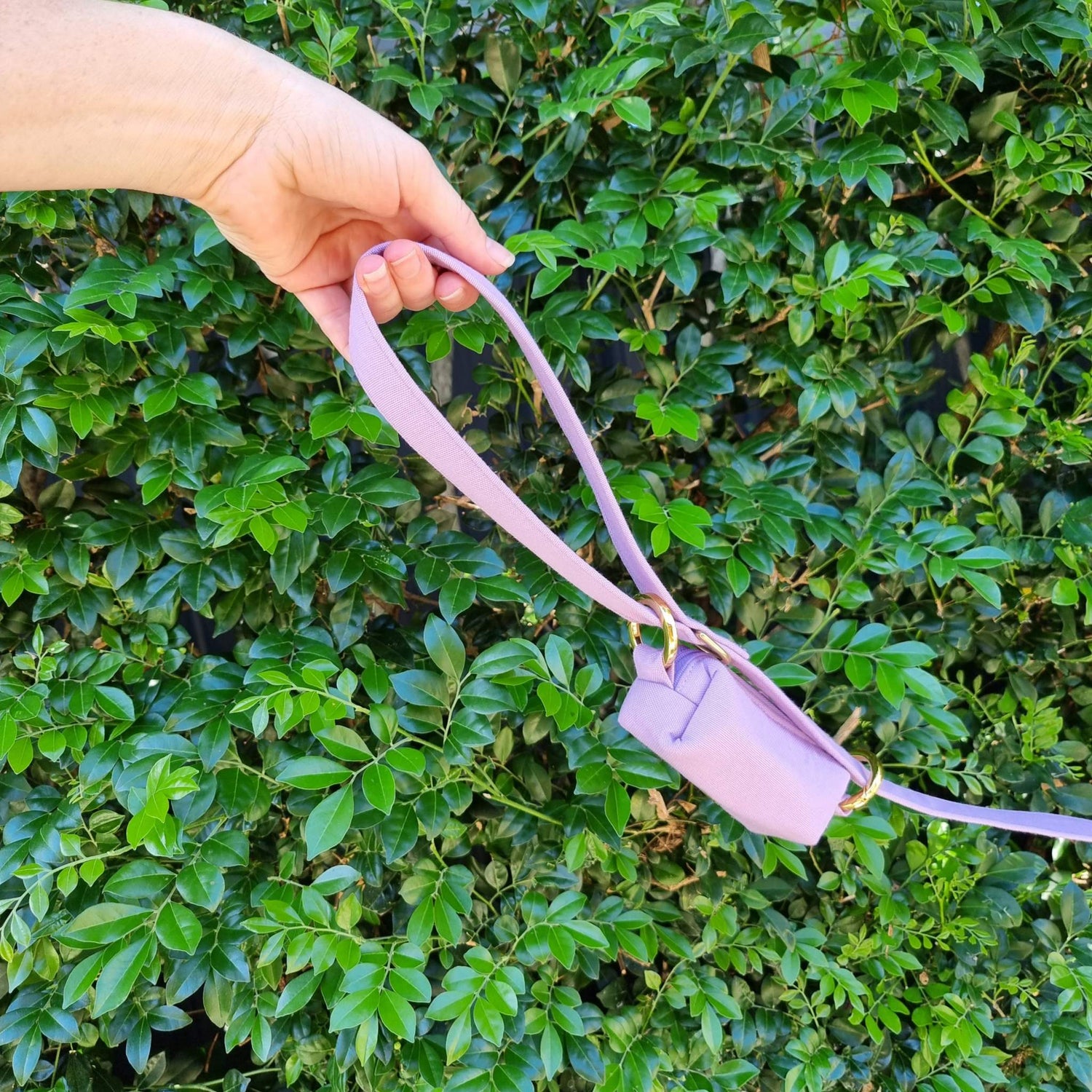 a close up of a person holding a pair of scissors 