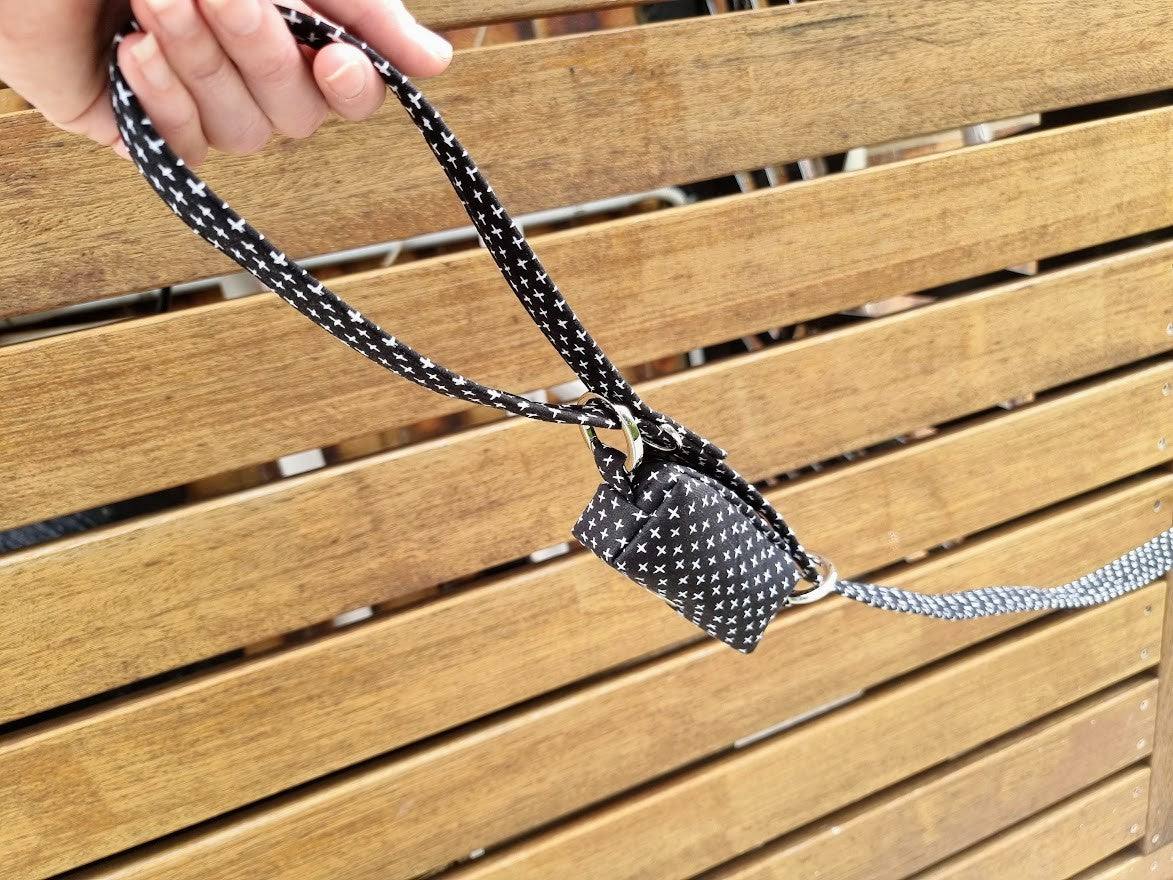 a person sitting on a bench holding a tennis racket 