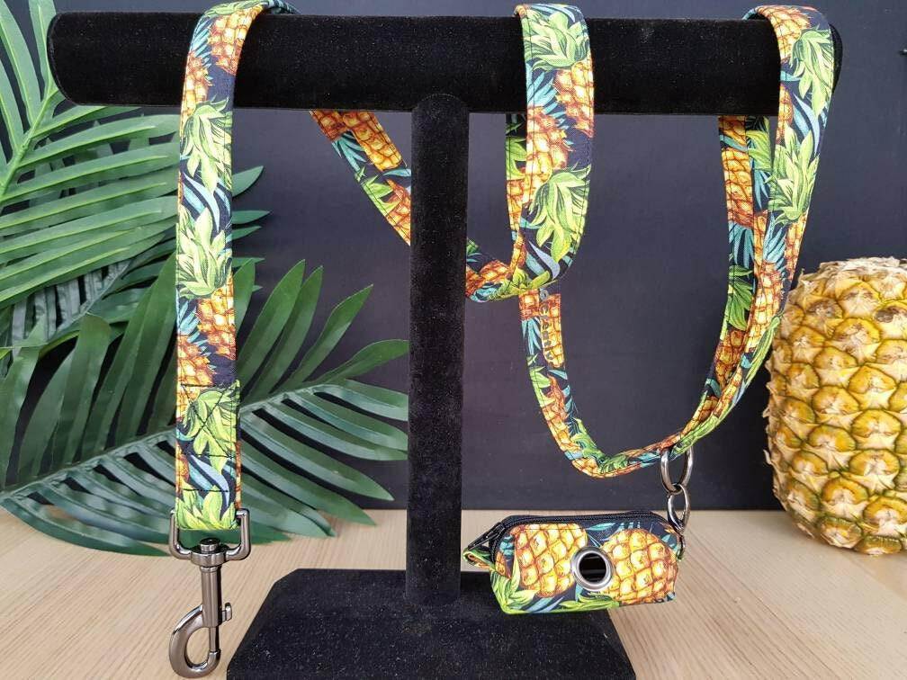 a couple of skateboards are on a wooden floor 